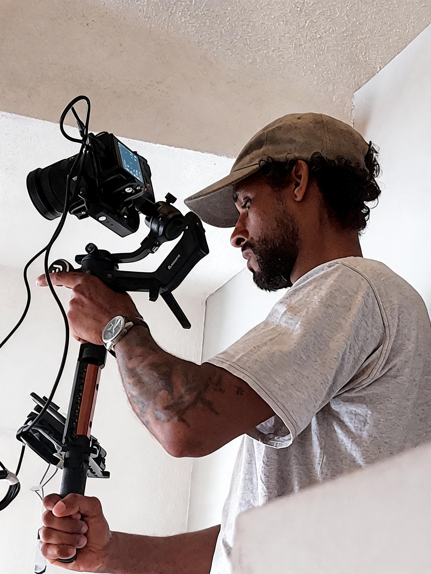 Daniel operating a cinema camera